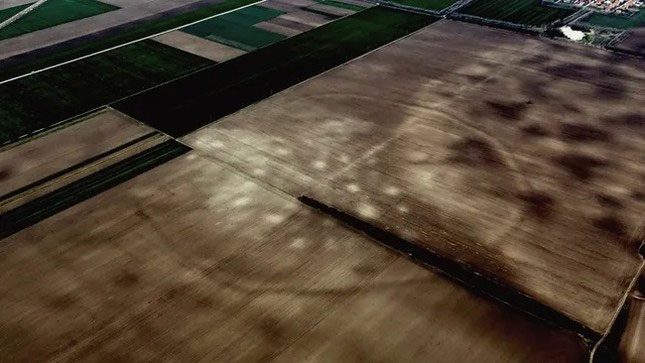Aerial view of agricultural land in Serbia, where Bronze Age settlements exist