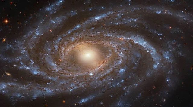 The habitable zone of the galaxy containing Earth may extend to the edge