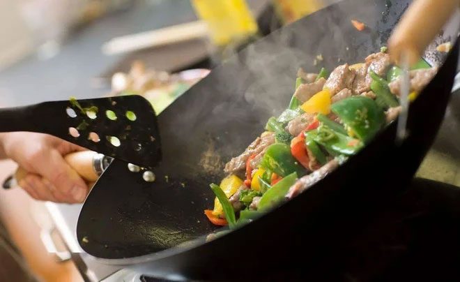 Food residue when reheated can ignite, promoting cancer development.