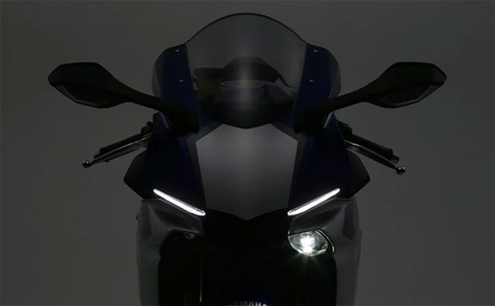 Headlights only shining on one side relates to safety measures and regulations in certain countries.