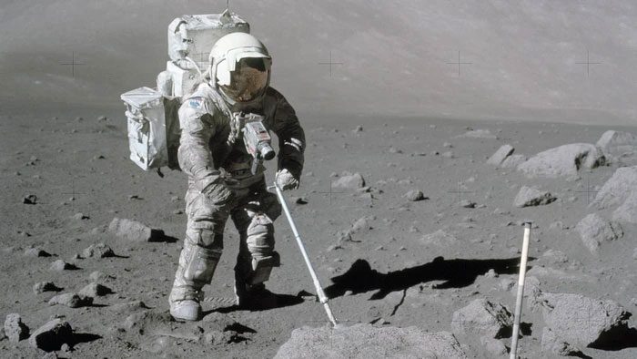 Astronaut Harrison Schmitt stepping onto the Moon on December 12, 1972.