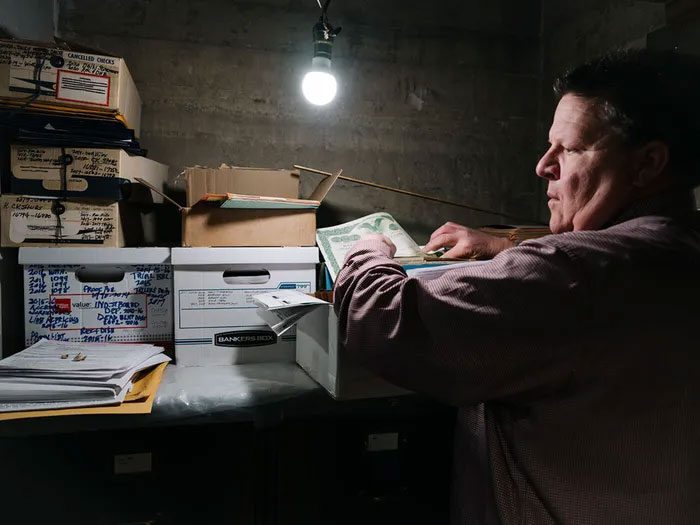 Sammons searching for documents in storage