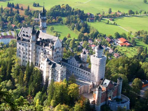 Neuschwanstein Castle rising high above the vertical cliff