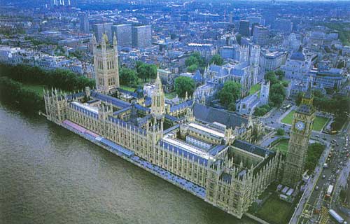 View of the Palace of Westminster from above to the Northeast showing the sprawling riverside façade.