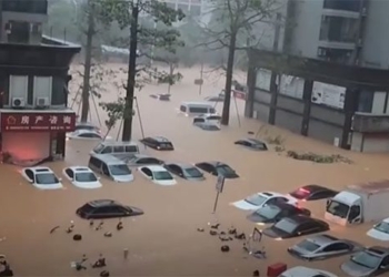 a large number of cars sunk in the sea after heavy rain in china 129020