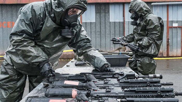 French soldiers participate in a nuclear, biological, and chemical warfare training exercise.