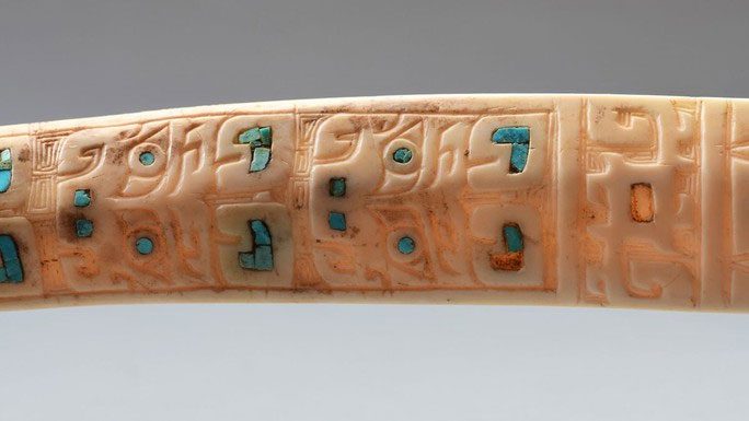 Ivory artifact inlaid with jade