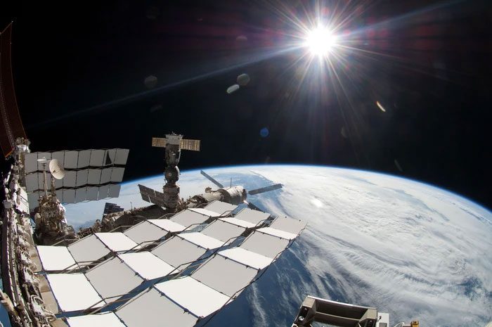 The speed of Earth's rotation remains constant throughout the space station's operation.