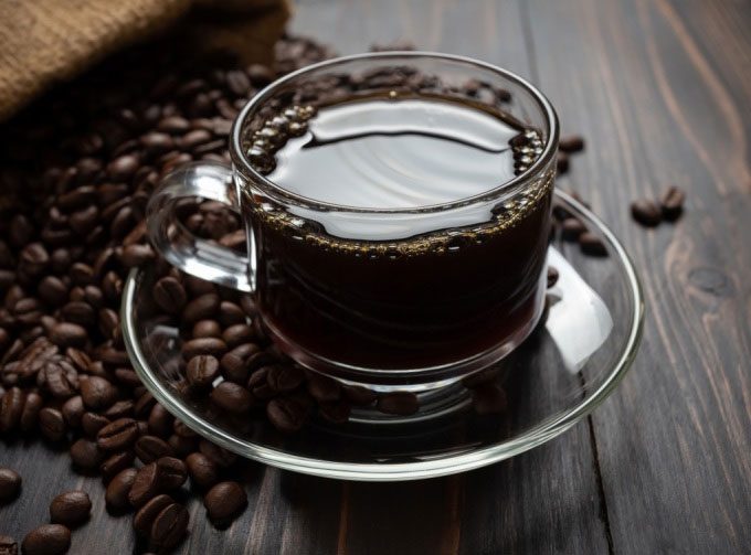 Caffeine in black coffee helps keep you awake.