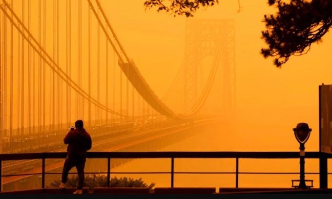 George Washington Bridge in New York engulfed in smoke.