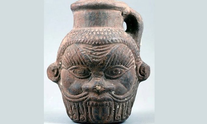 The Bes-shaped vase still shows traces of a hallucinogenic substance.
