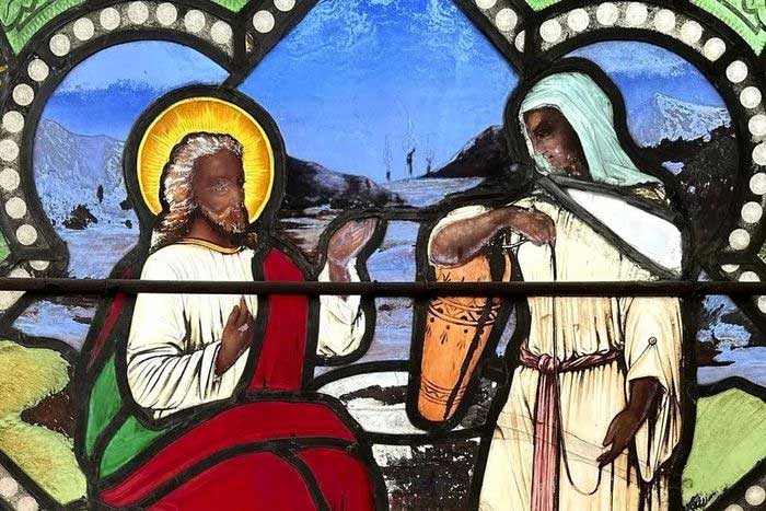 Stained glass depicting Jesus Christ as a person of color.