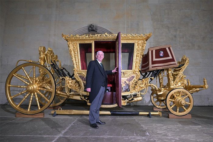 Speaker of the House of Commons Lindsay Hoyle poses with the State Coach