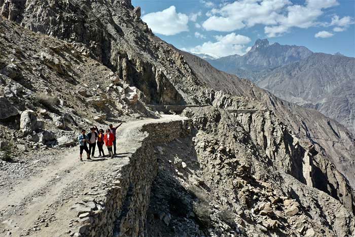 Many sections of the road are constructed with stones precariously positioned between cliffs