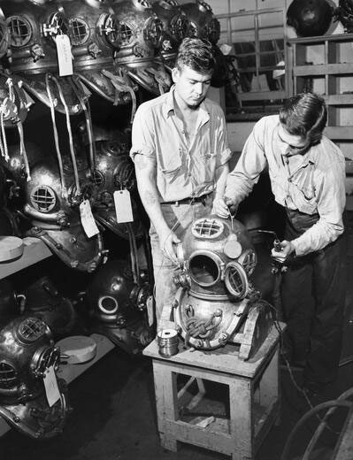 Diving suits were often bulky outfits