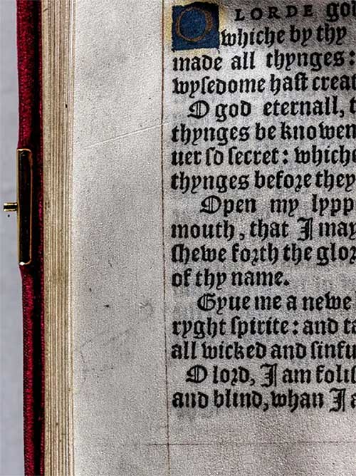 Faint hand drawing in the left margin.