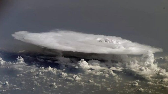 Bizarre cloud formations resembling a frozen flying saucer