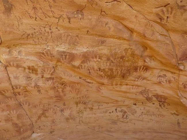 Tiny handprints in the 8,000-year-old Wadi Sura II cave.