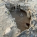 discovery of hundreds of columns in 7 000 year old tomb 127396