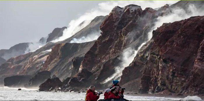 People in boats photograph The Smoking Hills