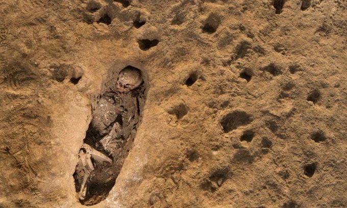 Child remains in a grave at Chan Chan.