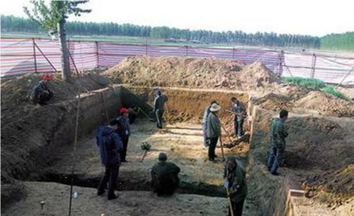 The ancient tomb discovered during canal dredging.