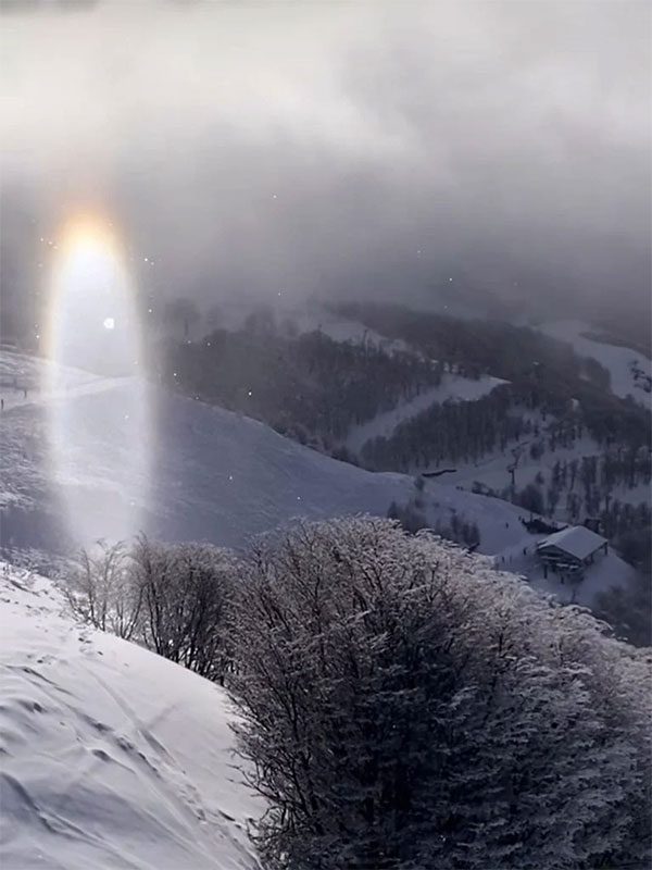 Gaby Chavez shows the glowing circular "gateway" in mid-air.
