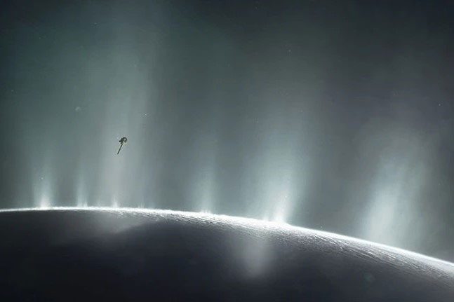 Plumes of water vapor erupting from the surface of Saturn's moon Enceladus