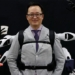 japan develops multi armed robots that can be worn on the back 128329