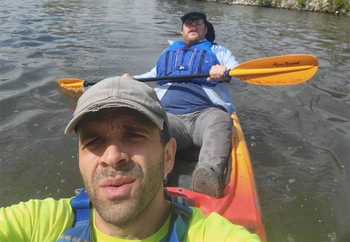 YouTuber Joey Santore (left) and Al Scorch kayaking on the Chicago River.