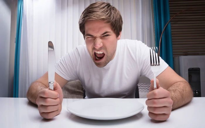 The body exhausts its fat reserves within days to weeks.