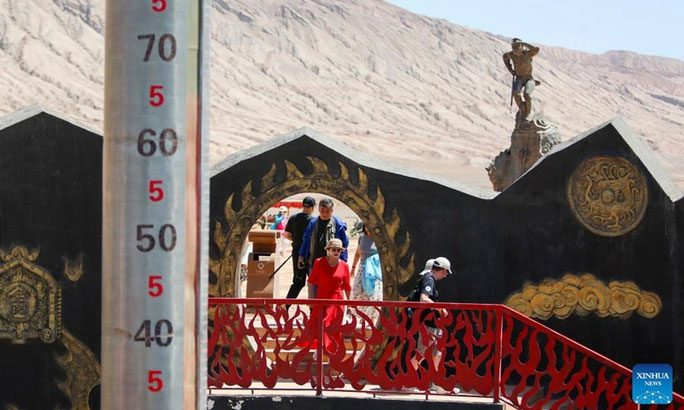 Tourists visiting Huo Yan Mountain on June 27.