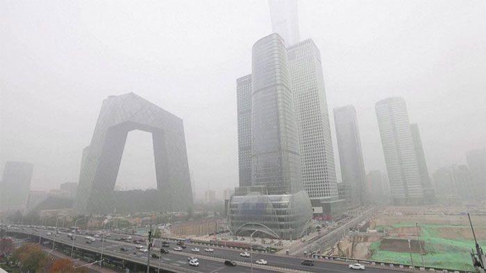 Buildings in Beijing, China shrouded in thick smog on November 5, 2021.