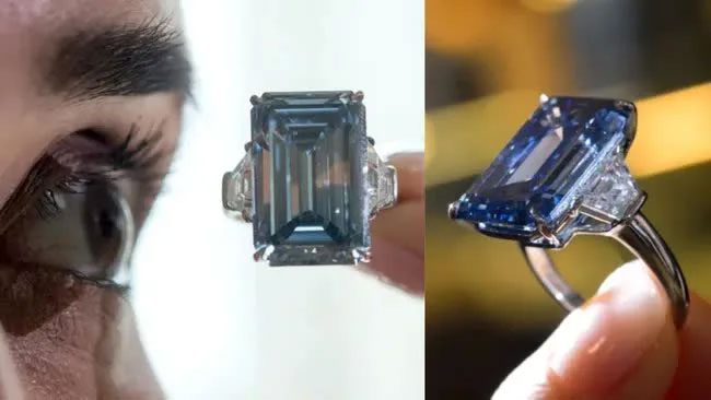 Christie's staff examining the 14.62-carat Oppenheimer Blue diamond.