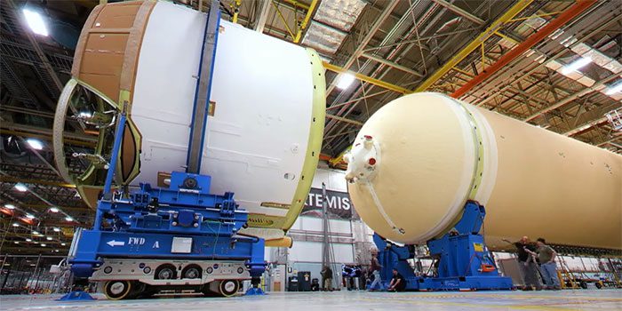 All five sections of the 65-meter-long rocket body are connected, with the engine block appearing to be the final component.