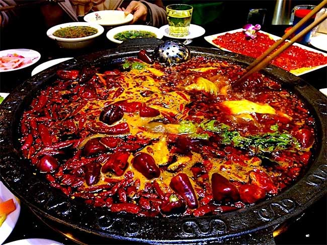 Sichuan hot pot is a famous dish in China, often attracting the attention of tourists.