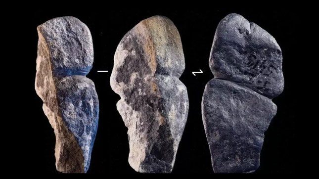  Pendant in the shape of a phallus carved from a piece of graphite.