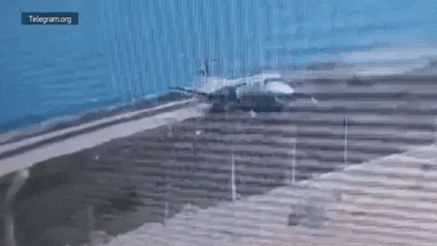 The plane skidded out of control on the runway and collided with a barrier