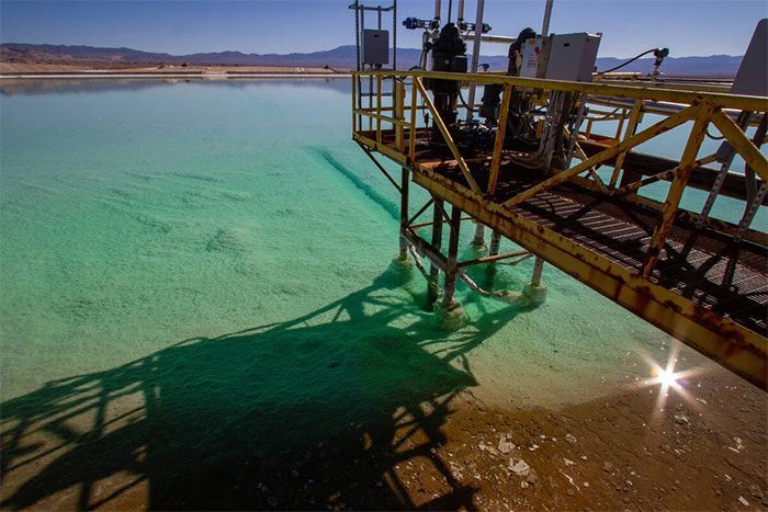 The mine pumps brine to the surface and transfers the brine into a series of shallow ponds for evaporation.