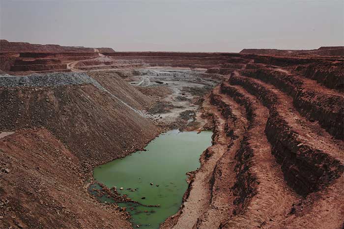 Open-pit uranium mine Tamgak at the Somair uranium extraction facility in Arlit