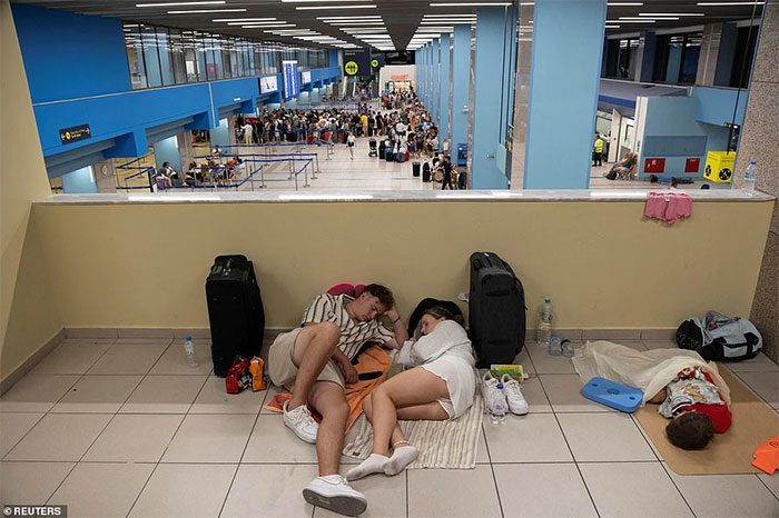 Towels or suitcases used as makeshift "beds."