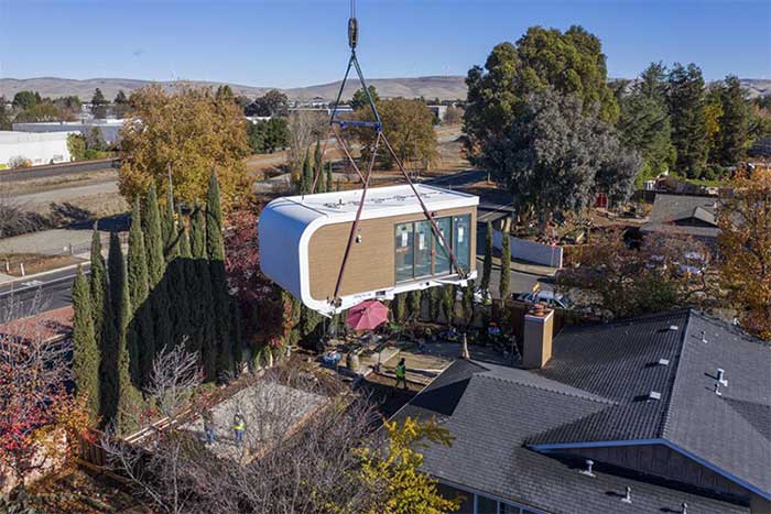A 3D-printed house during transport in California