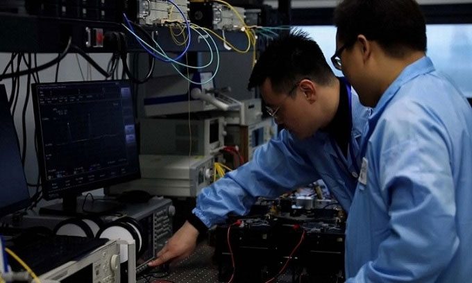 Researchers analyzing data on 6G networks.