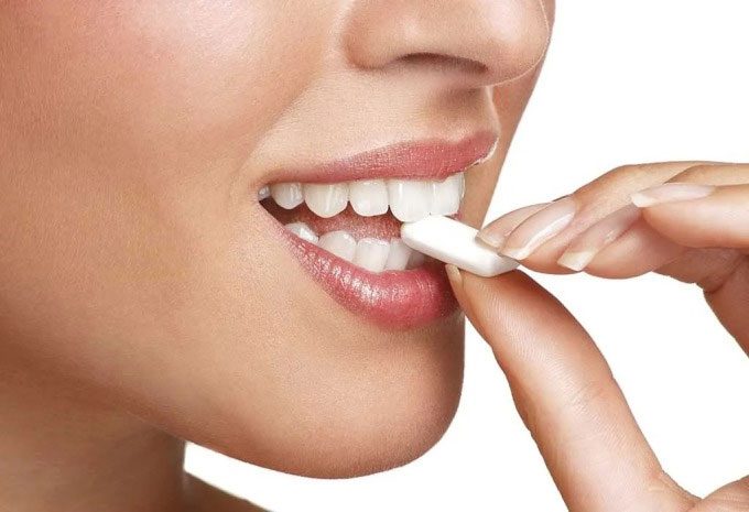 Chewing gum stimulates saliva production, helping to neutralize and balance the oral environment.