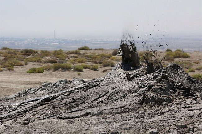 Mud volcano attracting tourists in Azerbaijan.