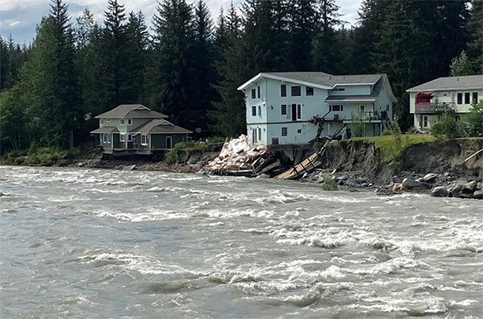 Mendenhall River levels rising along a neighborhood in Juneau, Alaska, on August 6, 2023.