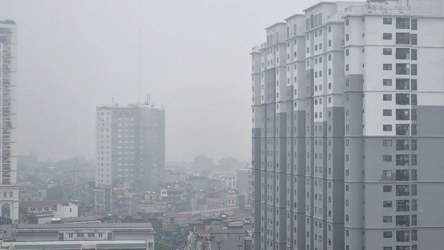 The area of high-rise buildings in Hanoi shrouded in haze.