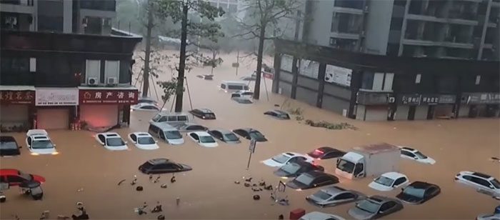 Most cars parked in front of homes were swept away or severely damaged.