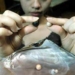 person finds secret to raising black pearl 5239