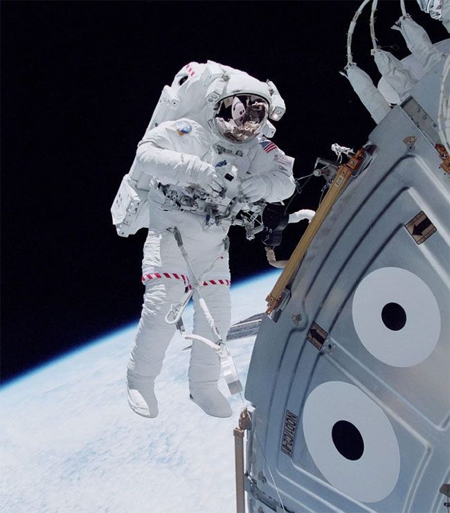 Astronauts working in space